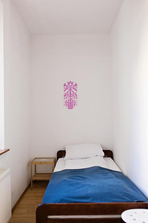 Posteľ alebo postele v izbe v ubytovaní Folk Hostel