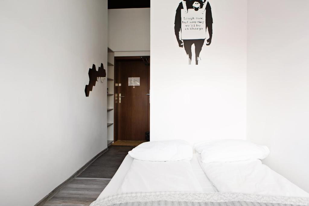 Posteľ alebo postele v izbe v ubytovaní Folk Hostel