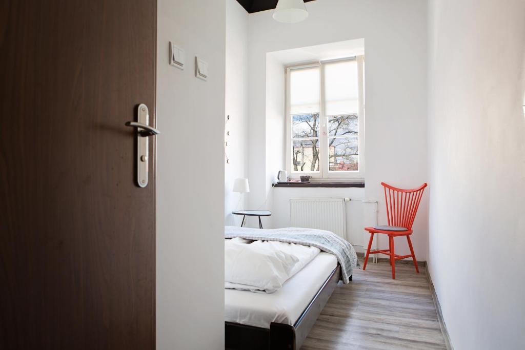 Posteľ alebo postele v izbe v ubytovaní Folk Hostel