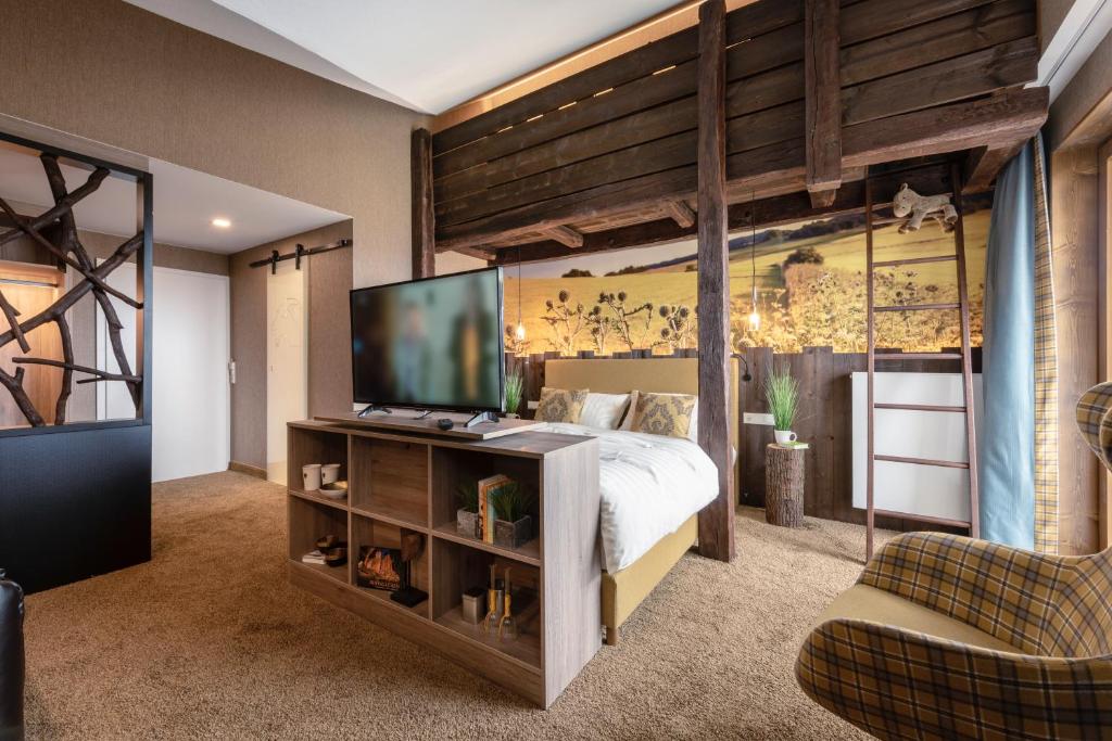 Postel nebo postele na pokoji v ubytování Berggasthof & Hotel Sennhütte