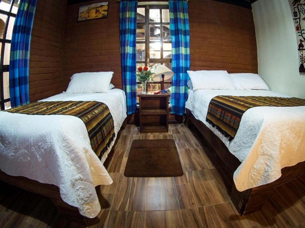 Postel nebo postele na pokoji v ubytování Casa del Arupo