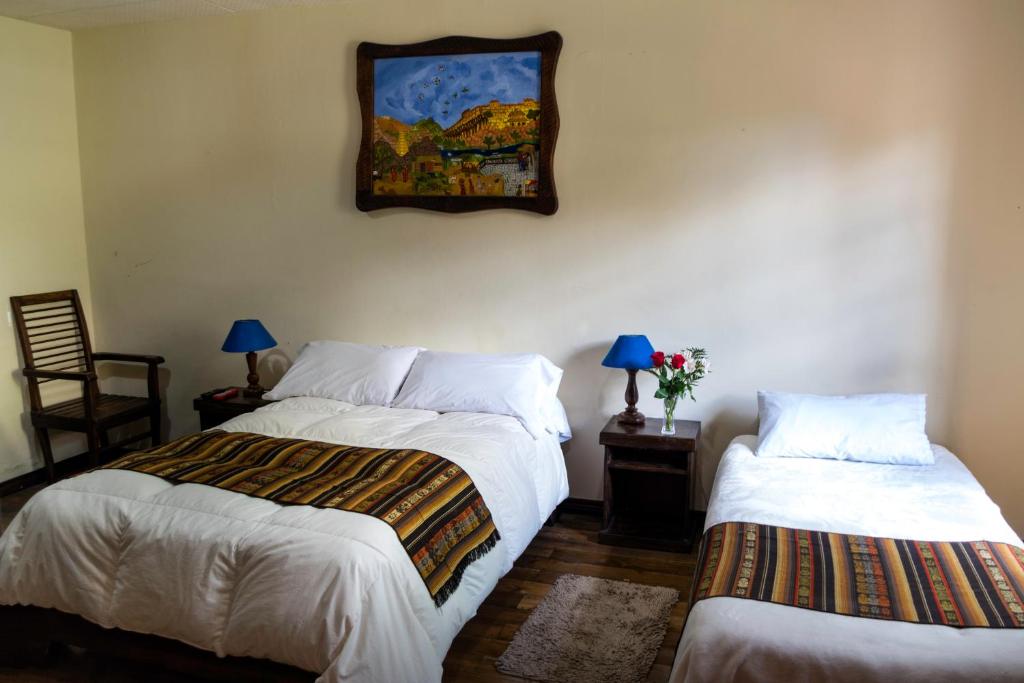 Postel nebo postele na pokoji v ubytování Casa del Arupo