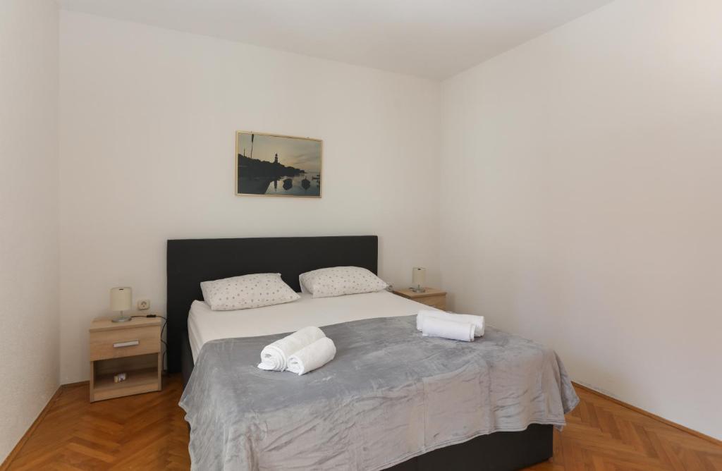 Postel nebo postele na pokoji v ubytování Apartment Perina