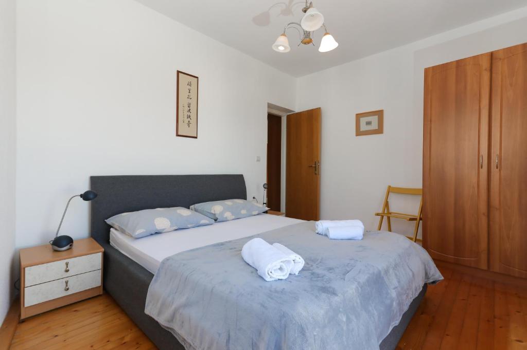 Postel nebo postele na pokoji v ubytování Apartment Perina