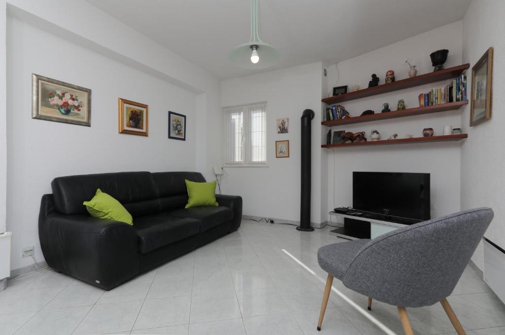 Posezení v ubytování Apartment Perina