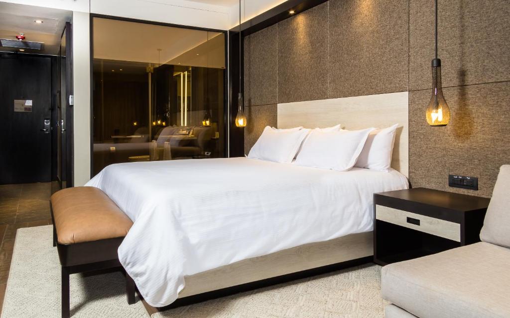 Postel nebo postele na pokoji v ubytování Eb Hotel By Eurobuilding Quito Airport