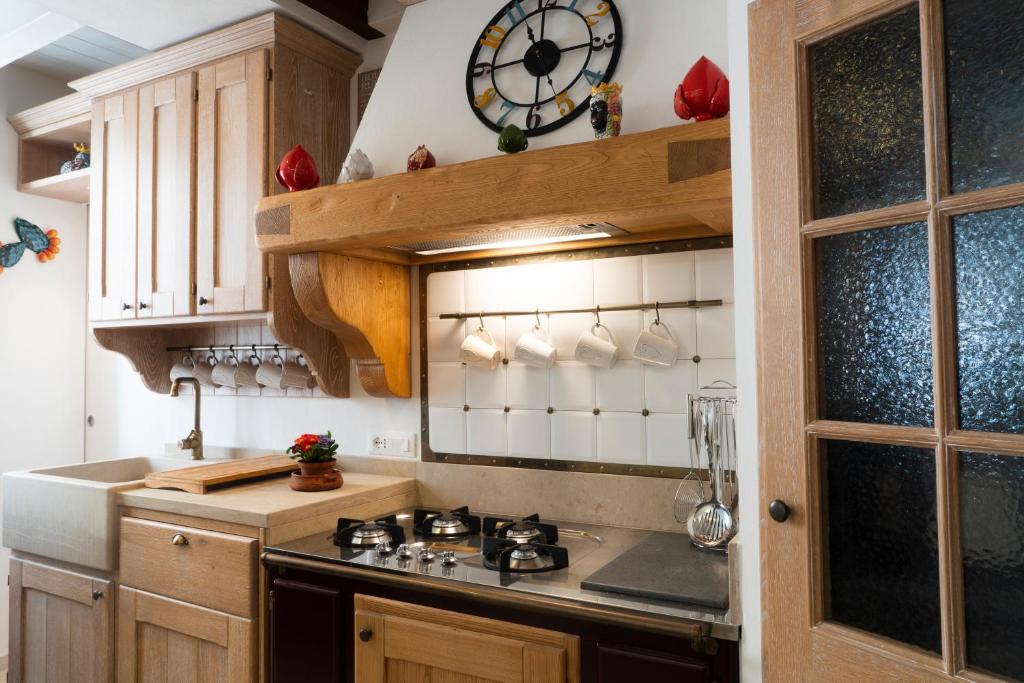 Kuchyň nebo kuchyňský kout v ubytování Quintessenza Luxury Domus