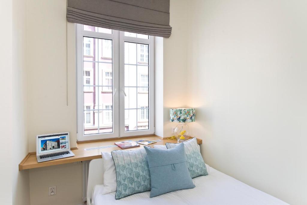 Posteľ alebo postele v izbe v ubytovaní Old Town Super Apartment Ogarna