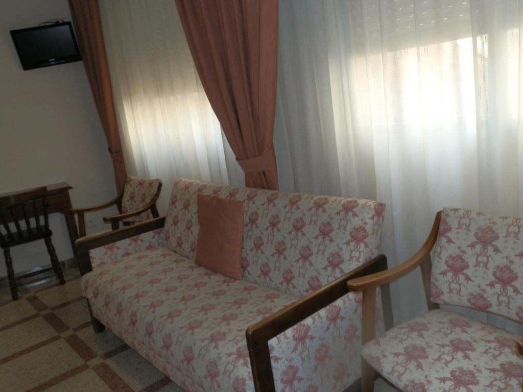 Posezení v ubytování Hostal San Poul
