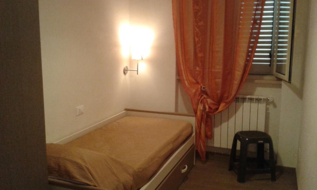 Łóżko lub łóżka w pokoju w obiekcie I Gerani