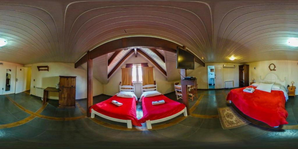 Uma cama ou camas num quarto em Aardvark Inn Pousada