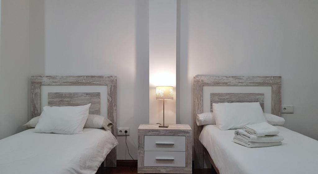 Postel nebo postele na pokoji v ubytování Apartamento Mirador del Tajo
