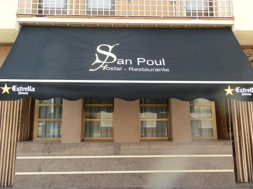 awning over the entrance to a building at Hostal San Poul in Consuegra