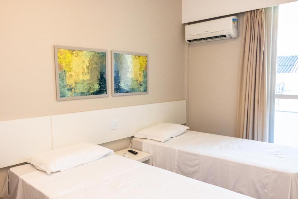 Postel nebo postele na pokoji v ubytování Antonius Imperial Hotel