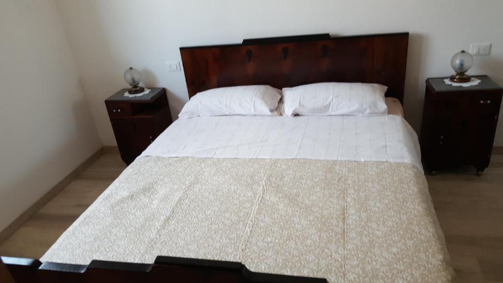 Postel nebo postele na pokoji v ubytování Le Botti B&B