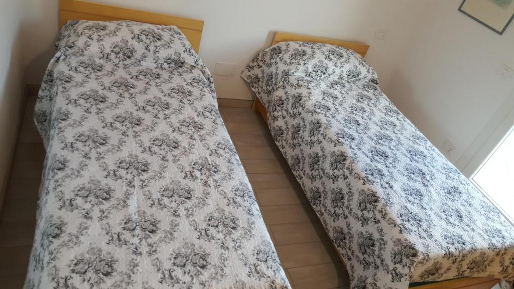 Postel nebo postele na pokoji v ubytování Le Botti B&B