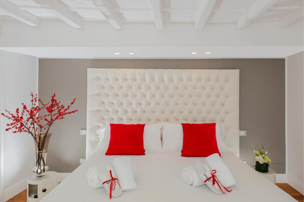 Postel nebo postele na pokoji v ubytování Hotel Navona