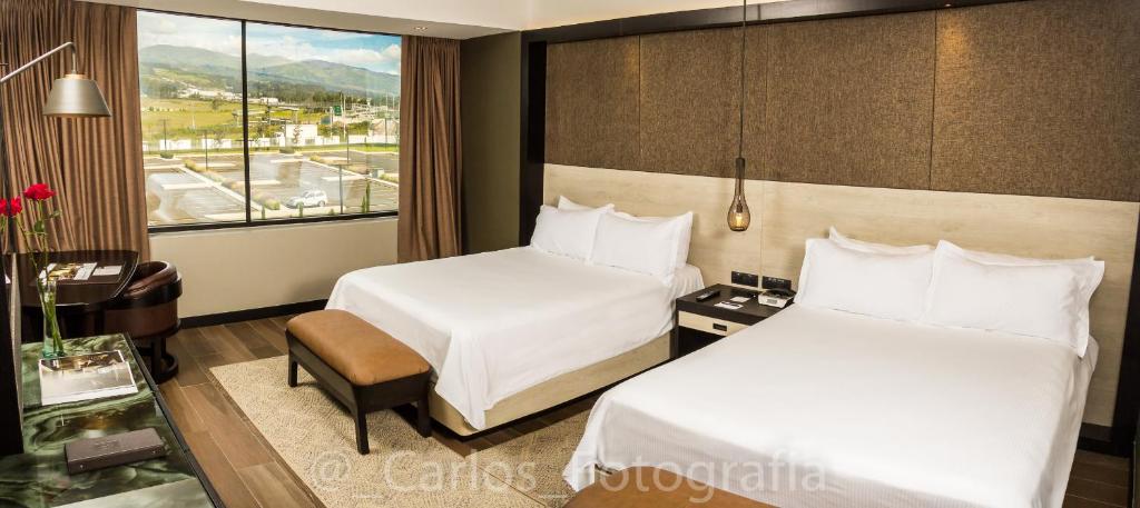 Postel nebo postele na pokoji v ubytování Eb Hotel By Eurobuilding Quito Airport