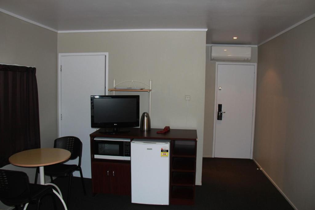 Kuchyň nebo kuchyňský kout v ubytování Sai Motels - Greenlane Auckland