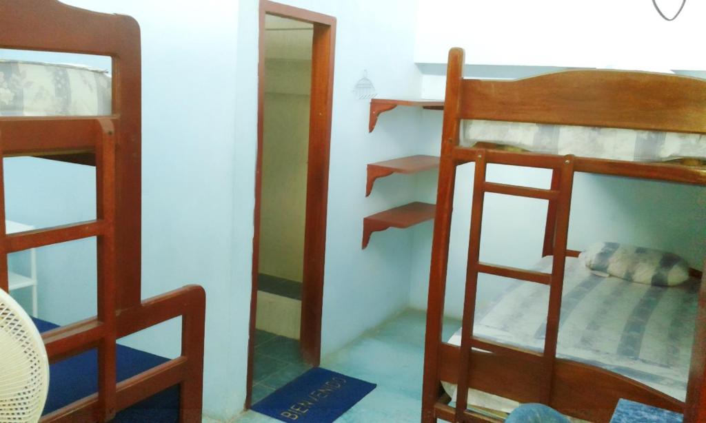 Palanda nebo palandy na pokoji v ubytování Hostal Aruba