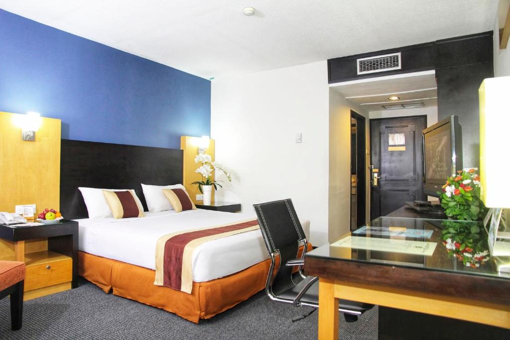 Postel nebo postele na pokoji v ubytování Jayakarta Hotel Jakarta