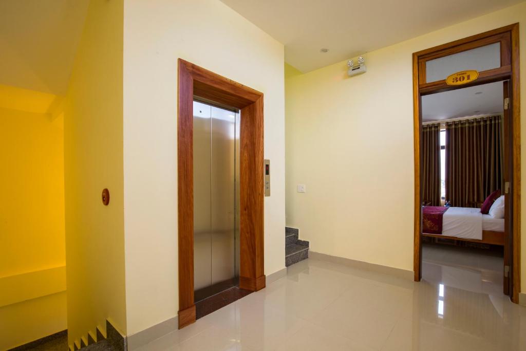 Postel nebo postele na pokoji v ubytování RIVERBANK MOTEL
