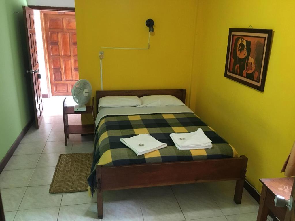 Postel nebo postele na pokoji v ubytování Hotel El Albergue Español