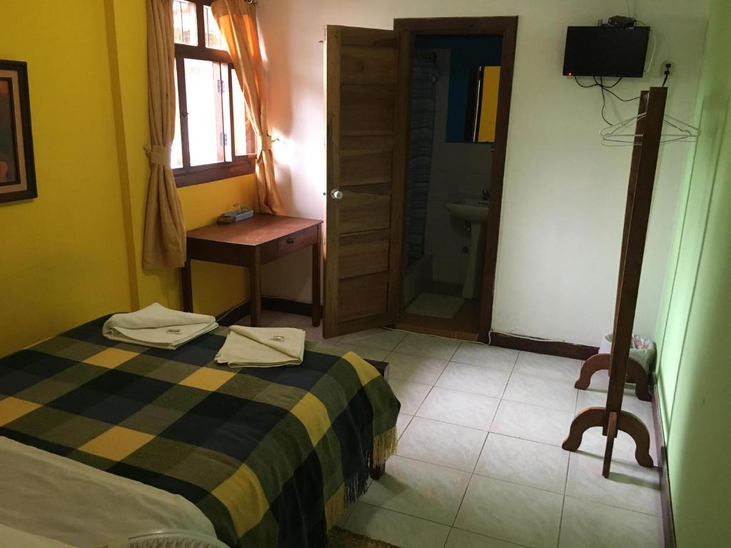 Postel nebo postele na pokoji v ubytování Hotel El Albergue Español