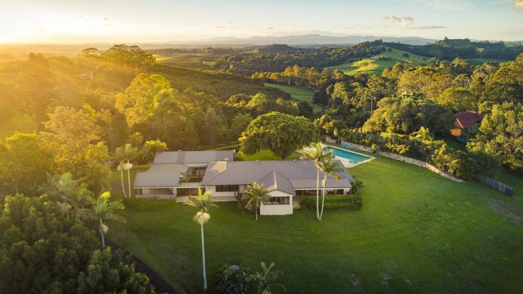an aerial view of a house on a lush green field at Ferncrest in Fernleigh