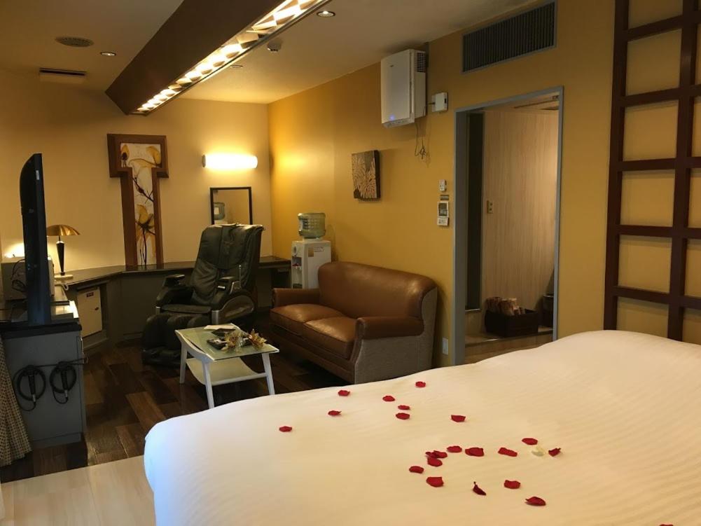 Postel nebo postele na pokoji v ubytování Hotel Water Gate Ichinomiya (Adult Only)