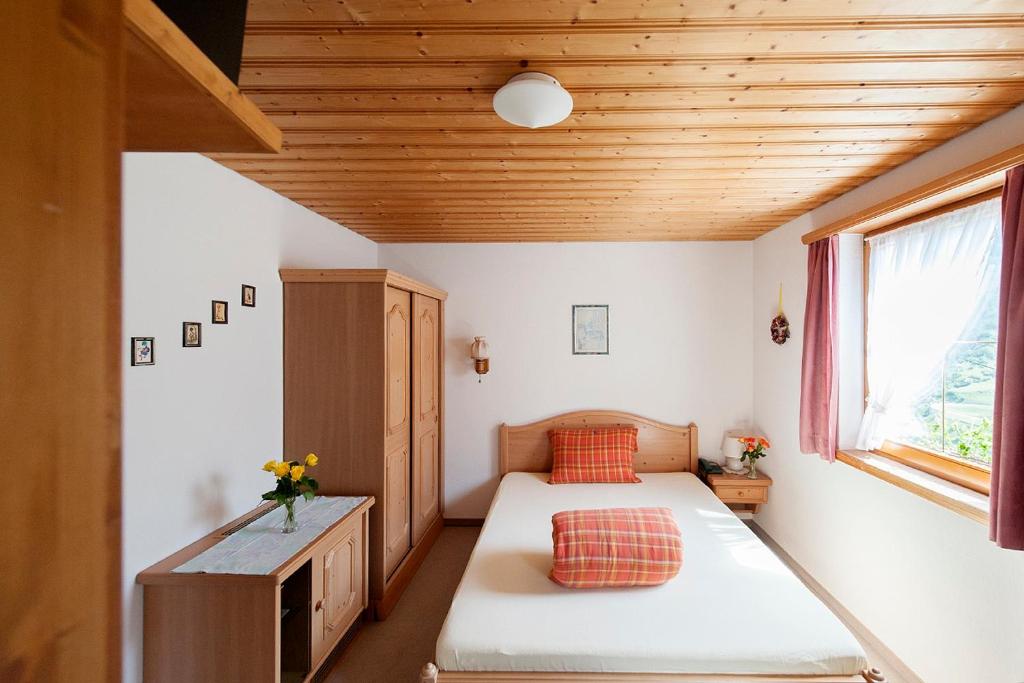 Postel nebo postele na pokoji v ubytování Hotel Cuntera