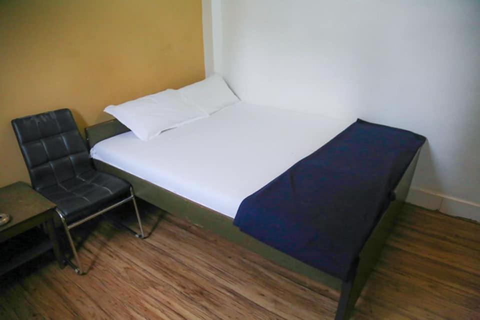 Postel nebo postele na pokoji v ubytování Hotel Happy Home