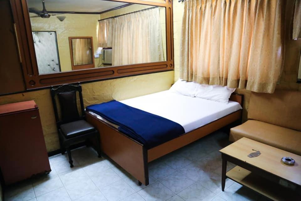 Postel nebo postele na pokoji v ubytování Hotel Happy Home