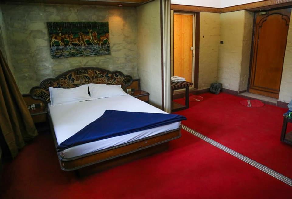 Postel nebo postele na pokoji v ubytování Hotel Happy Home