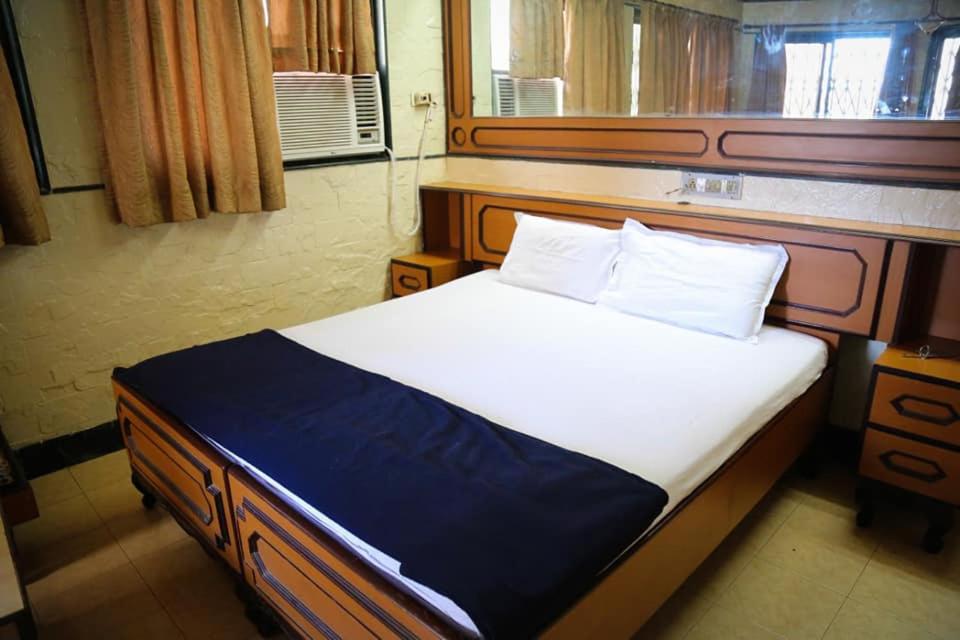 Postel nebo postele na pokoji v ubytování Hotel Happy Home