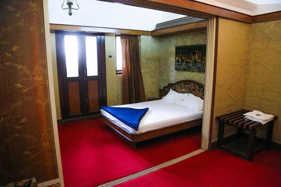 Postel nebo postele na pokoji v ubytování Hotel Happy Home