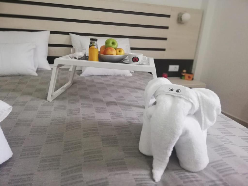 Postel nebo postele na pokoji v ubytování Garni Hotel 11tica DM