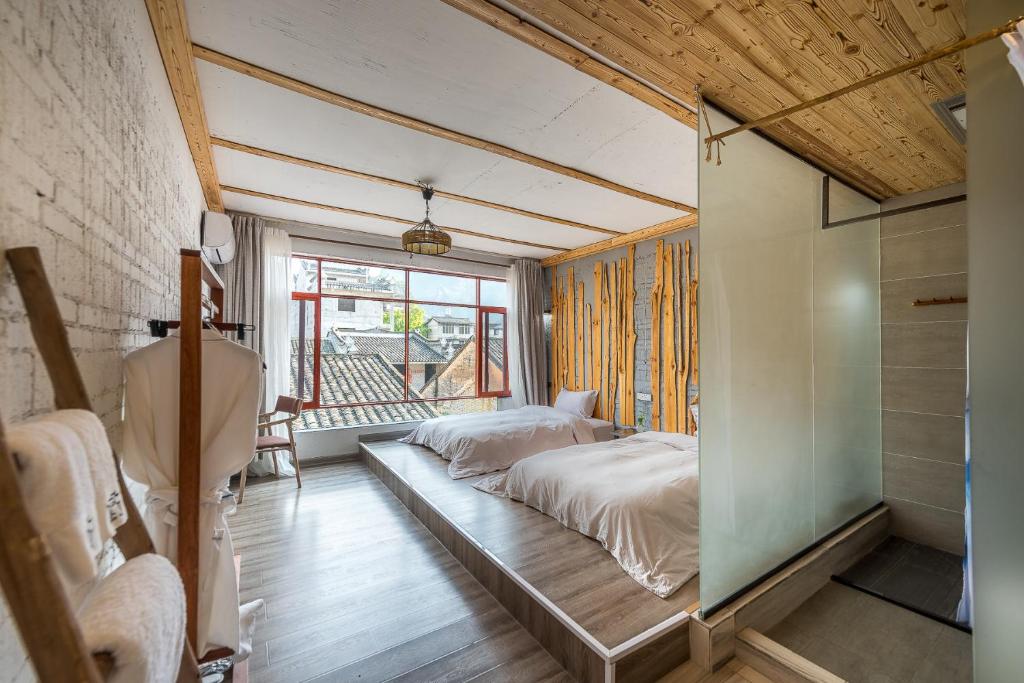 Postel nebo postele na pokoji v ubytování Autumn Inn