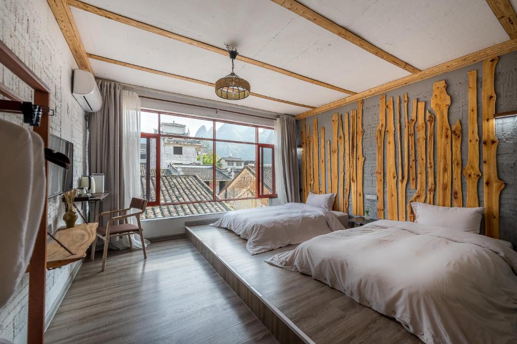 Postel nebo postele na pokoji v ubytování Autumn Inn