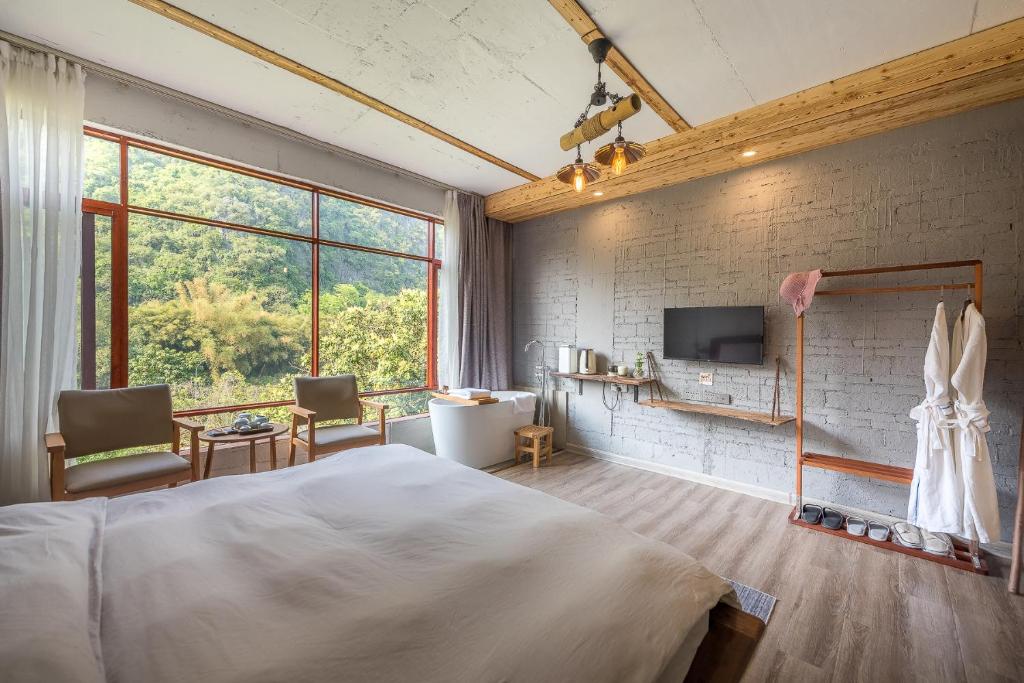 Postel nebo postele na pokoji v ubytování Autumn Inn
