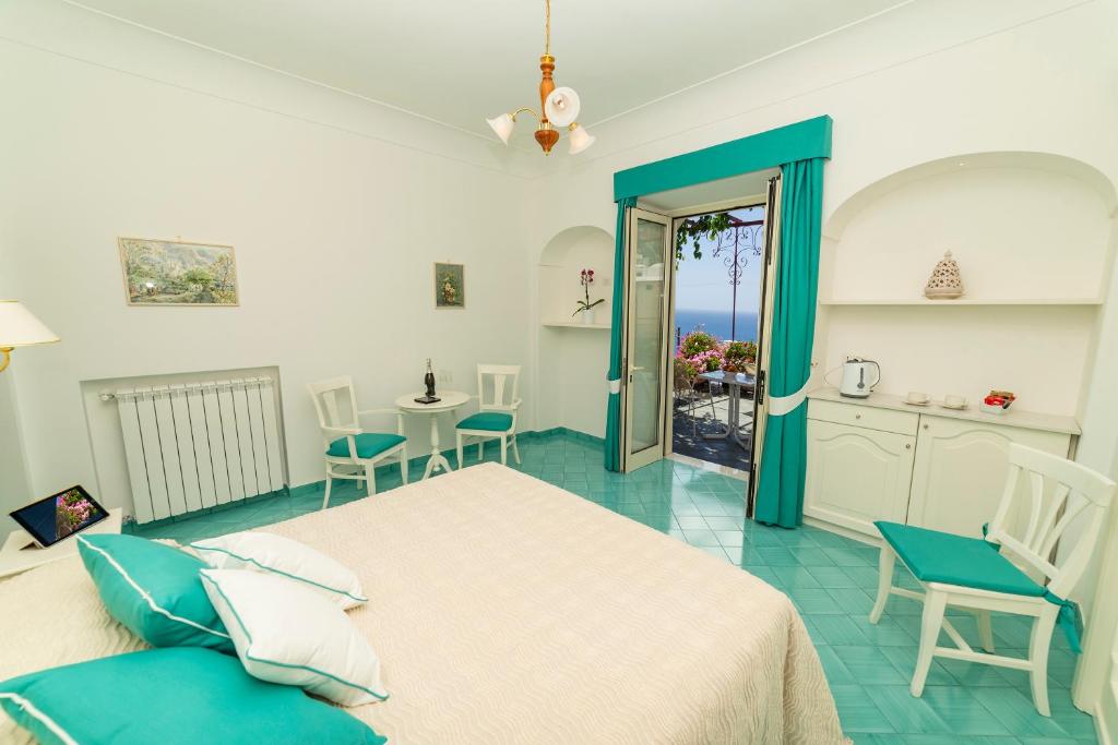 Postel nebo postele na pokoji v ubytování Casa Maresca Residence