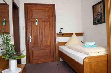 Postel nebo postele na pokoji v ubytování Hotel Rummeni