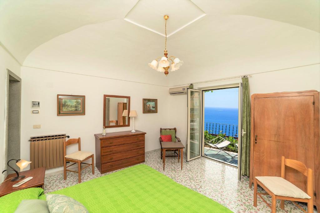 Postel nebo postele na pokoji v ubytování Casa Maresca Residence