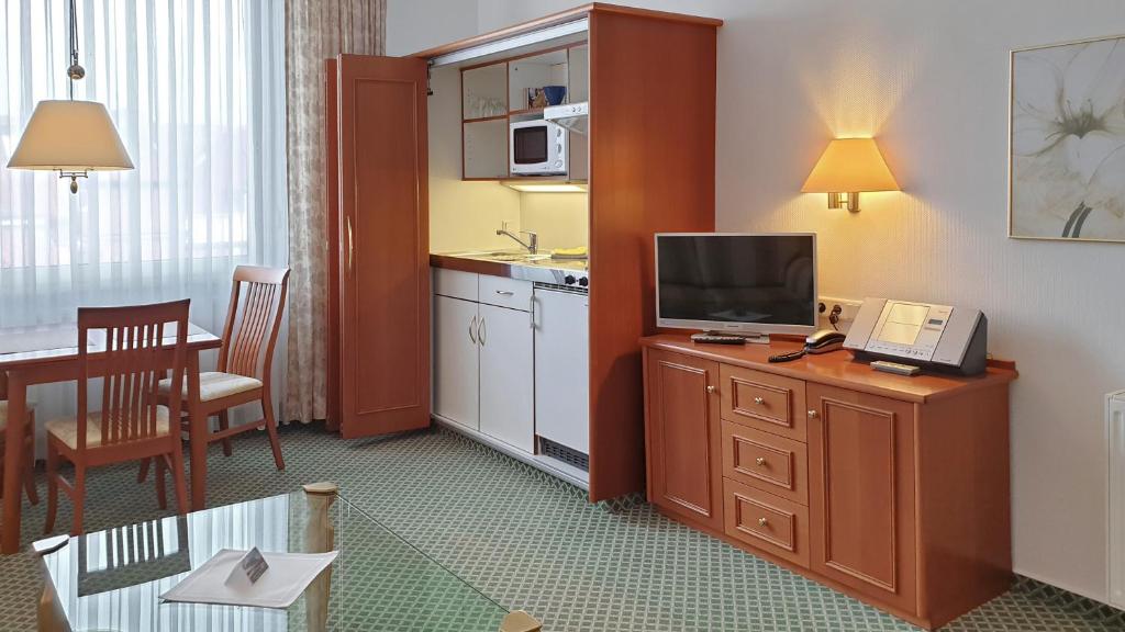 Kuchyň nebo kuchyňský kout v ubytování Hotel Westfalenhof