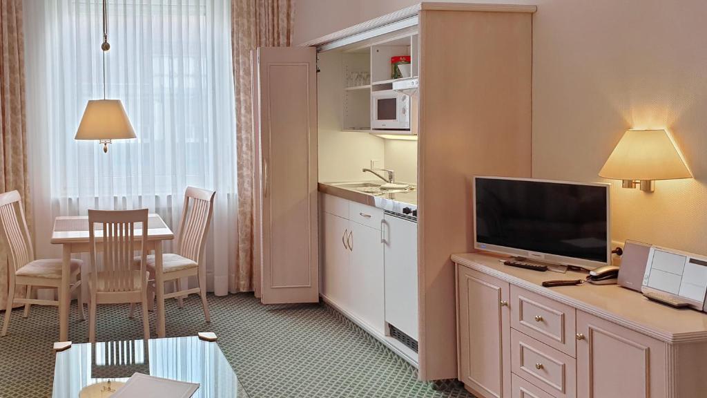 Kuchyň nebo kuchyňský kout v ubytování Hotel Westfalenhof