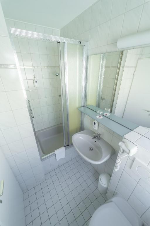 Koupelna v ubytování Hotel Carmen