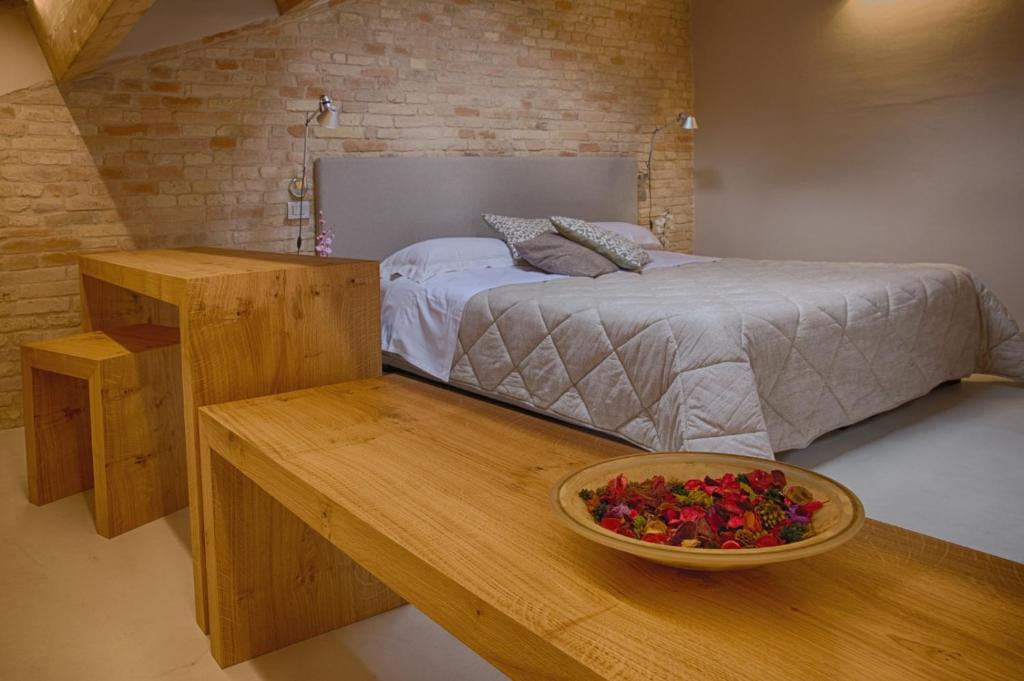 Postel nebo postele na pokoji v ubytování Residenza Corso Baccio
