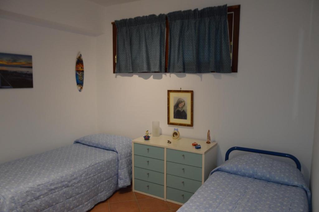 Postel nebo postele na pokoji v ubytování Villa Matilde