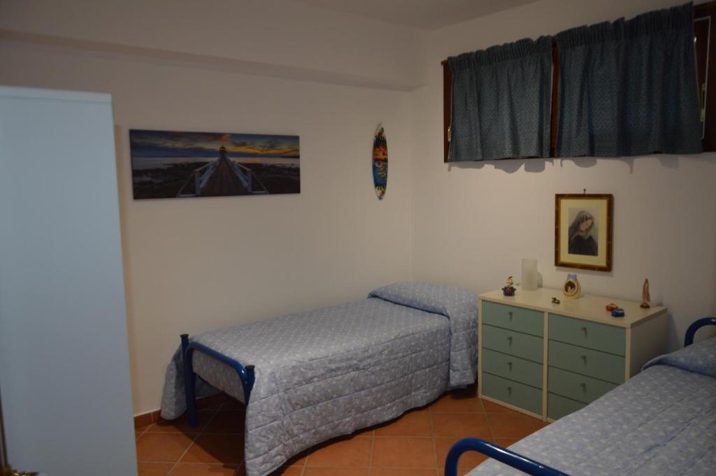 Postel nebo postele na pokoji v ubytování Villa Matilde