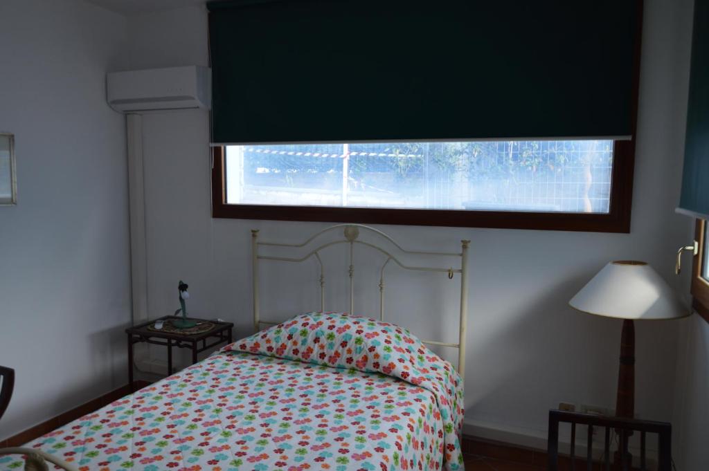 Postel nebo postele na pokoji v ubytování Villa Matilde